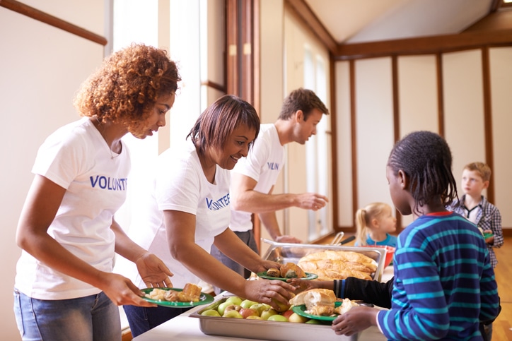 Volunteers distributing food